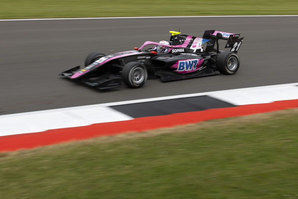 Sophia Floersch inside an F3 car racing.