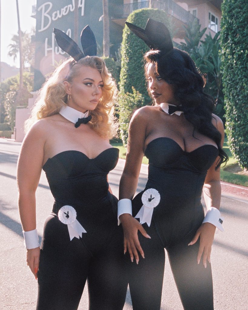 Miranda and Phoenix wearing black bunny costumes