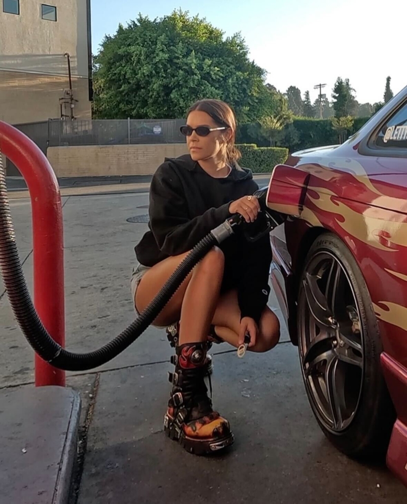 Photographer Hailey Magoon cosplays as "Letty Ortiz" with her Nissan 240SX from The Fast and the Furious.