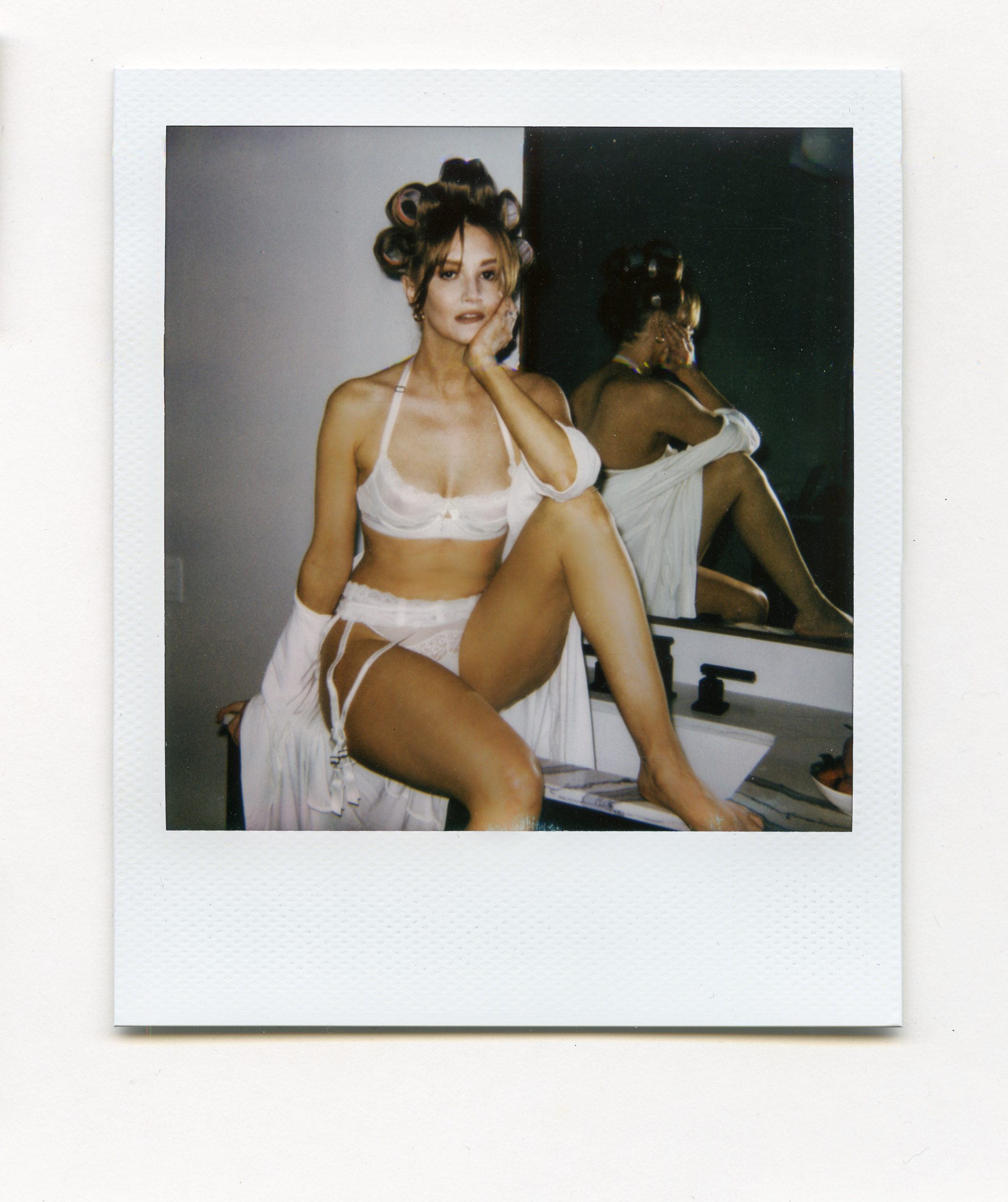 Dominique Jane white lingerie curls.