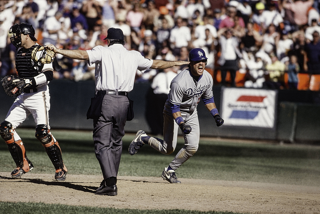 Mike Piazza is an MLB Hall of Fame catcher who played for the Los Angeles Dodgers, New York Mets and Oakland Athletics.