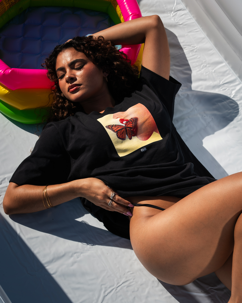 Model wearing Playboy Butterfly Cover Tee.