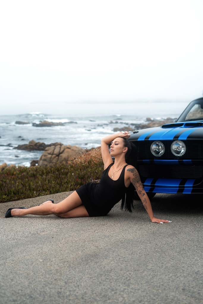 Emily ICX aka Emily Corson is a car model from Minnesota that has posed with some of the world's top vehicles.