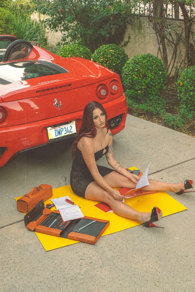 Emily ICX aka Emily Corson is a car model from Minnesota that has posed with some of the world's top vehicles.