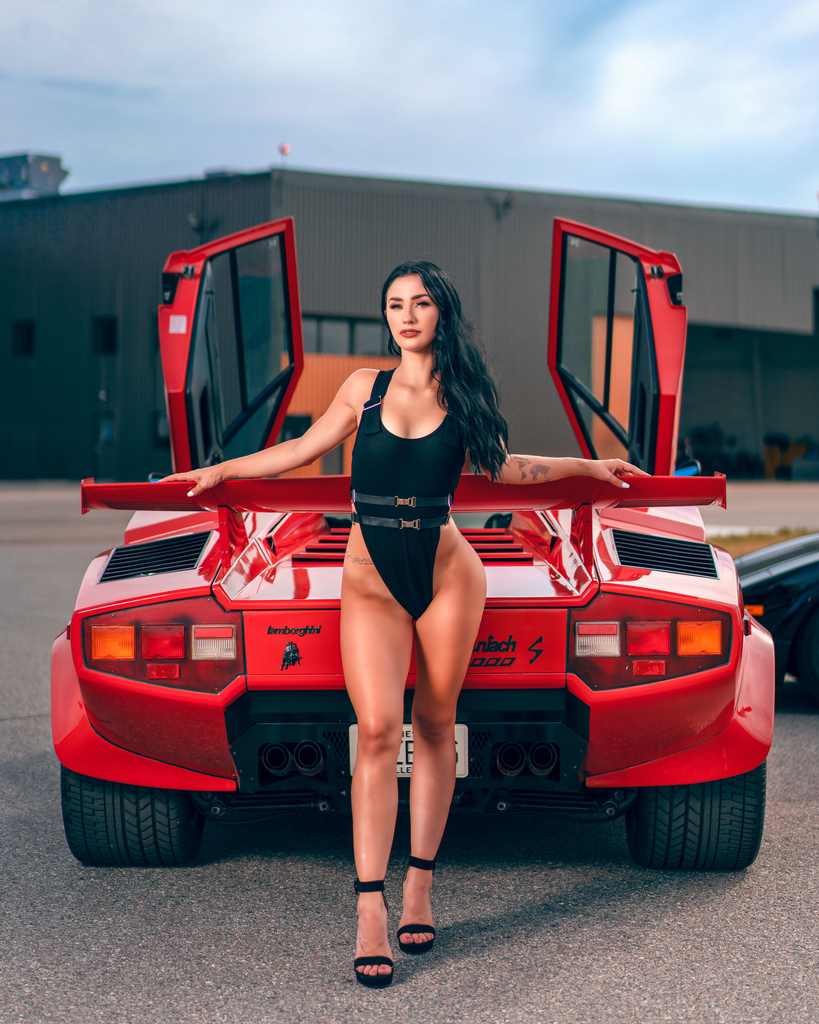 Emily ICX aka Emily Corson is a car model from Minnesota that has posed with some of the world's top vehicles.