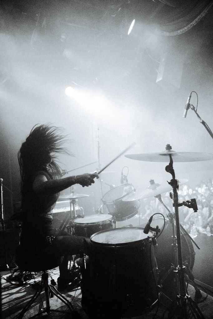 Brittany Bowman, a dynamic drummer originally from Chicago, has rapidly ascended the music industry's ranks with her electrifying performances.